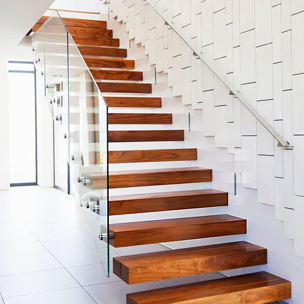 Open tread stairs with glass panels designed by Rataul Stairs Ballarat<br />
